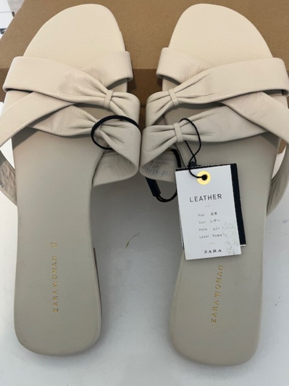 Zara bone color leather flat sandal.